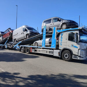 VOLVO FM 337 CARGADO 6 CON DOS FURGONES CARAVANA